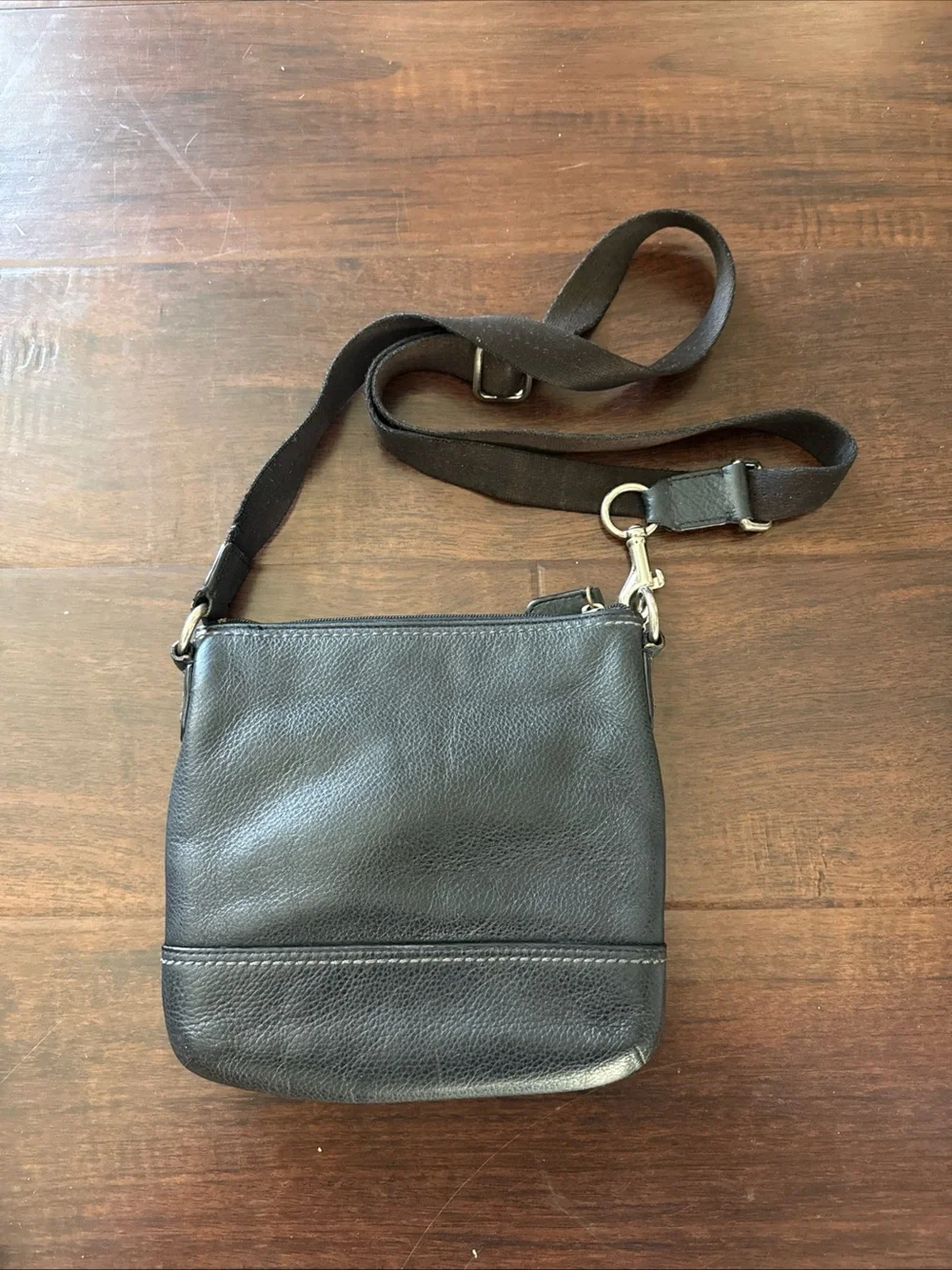 Coach does leather hands